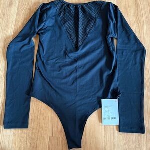 Rhaika London Pri Mesh black long-sleeve bodysuit.